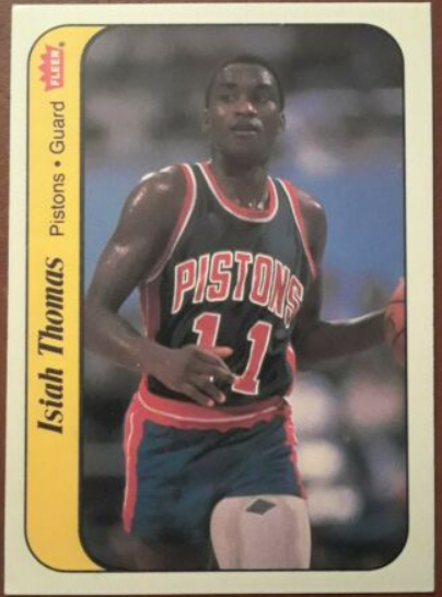 1986 Fleer sticker #10 featuring Detroit Piston's point guard Isiah Thomas
